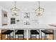 Spacious kitchen island with seating and modern pendant lighting at 126 Still Creek Dr, Mooresville, NC 28115