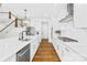 Bright kitchen with stainless steel appliances and a large quartz countertop at 126 Still Creek Dr, Mooresville, NC 28115