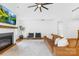Bright living room features a modern fireplace and comfortable seating area at 126 Still Creek Dr, Mooresville, NC 28115
