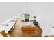 Bright living room has hardwood floors, lots of windows, and a fireplace at 126 Still Creek Dr, Mooresville, NC 28115