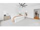Spacious main bedroom features soft carpet, a ceiling fan, and ensuite bathroom at 126 Still Creek Dr, Mooresville, NC 28115