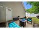 Outdoor patio furnished with comfortable seating, a fire pit, and a barbecue grill for outdoor entertaining at 12663 Windyedge Rd, Huntersville, NC 28078
