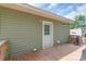 View of the wooden back deck with a door to the home at 1316 Wiscassett St, Albemarle, NC 28001