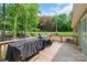 Large wooden deck with railing and space for grilling and outdoor enjoyment at 1316 Wiscassett St, Albemarle, NC 28001
