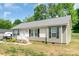 Well-maintained single-story home with neat landscaping and a welcoming facade at 1316 Wiscassett St, Albemarle, NC 28001
