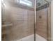 Close up of the tiled walk-in shower featuring a rain shower head at 1316 Wiscassett St, Albemarle, NC 28001