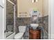 Bathroom with shower, sink with vanity and decorative mirror at 135 Waycross Dr, Rockwell, NC 28110