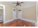 Bedroom features hardwood flooring and direct access to closets at 135 Waycross Dr, Rockwell, NC 28110