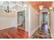 View of kitchen and dining room from tiled hallway at 135 Waycross Dr, Rockwell, NC 28110