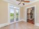 Living room featuring double doors to backyard and fireplace at 135 Waycross Dr, Rockwell, NC 28110