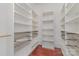 Walk-in closet with built-in shelving and wire baskets at 135 Waycross Dr, Rockwell, NC 28110