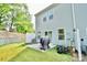 Private backyard featuring a patio area ideal for outdoor dining and relaxation in a serene setting at 1365 Eagle Claw Dr, Kannapolis, NC 28083
