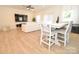 Dining area with modern table and chairs, with a seamless transition to the living room at 1365 Eagle Claw Dr, Kannapolis, NC 28083