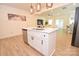 Bright open kitchen features a center island, stainless steel appliances, and an open floor plan at 1365 Eagle Claw Dr, Kannapolis, NC 28083