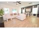 Bright living room with a view of dining area, features modern decor and lots of natural light at 1365 Eagle Claw Dr, Kannapolis, NC 28083