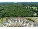 A high angle aerial view of a neighborhood next to an expansive nature preserve at 14128 Morningate St, Huntersville, NC 28078