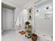 Bright bathroom with decorative accessories, a glass-enclosed shower, and a stylish vanity area at 14128 Morningate St, Huntersville, NC 28078
