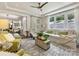Comfortable living room with natural light, hardwood floors, neutral decor, and views of the outdoors at 14128 Morningate St, Huntersville, NC 28078
