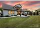 Expansive backyard with patio and well-maintained lawn at 14128 Morningate St, Huntersville, NC 28078
