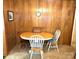 Dining room features wood paneling and an oval table with 3 chairs at 1460 Legion Rd, Fort Mill, SC 29715