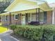 Inviting front porch with bench seating and manicured hedges at 1460 Legion Rd, Fort Mill, SC 29715