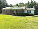 Charming single-story home with a well-maintained lawn and mature trees at 1460 Legion Rd, Fort Mill, SC 29715