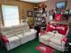 Relaxing living room with comfortable couches and sports memorabilia at 1460 Legion Rd, Fort Mill, SC 29715