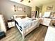 Spacious bedroom featuring modern flooring, neutral walls, and a ceiling fan at 1545 Lewis Farm Rd, Kings Mountain, NC 28086