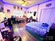 Fun bedroom with LED strip lighting, foosball table, hardwood flooring, and ceiling fan at 1545 Lewis Farm Rd, Kings Mountain, NC 28086