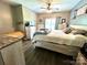 Bedroom with a ceiling fan, neutral paint, and a bright window to enjoy the day at 1545 Lewis Farm Rd, Kings Mountain, NC 28086