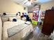 Clean bedroom with wood flooring and a ceiling fan at 1545 Lewis Farm Rd, Kings Mountain, NC 28086