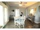 Dining area boasts natural light, modern flooring, and a ceiling fan at 1545 Lewis Farm Rd, Kings Mountain, NC 28086