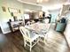 A light and airy dining area next to kitchen and living areas with modern flooring at 1545 Lewis Farm Rd, Kings Mountain, NC 28086