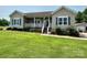 Charming ranch-style home with a covered front porch and mature landscaping at 1545 Lewis Farm Rd, Kings Mountain, NC 28086