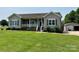 Charming home with a large, green front yard, covered porch and detached garage at 1545 Lewis Farm Rd, Kings Mountain, NC 28086