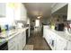 Well-lit kitchen featuring granite countertops, white cabinetry, and stainless appliances at 1545 Lewis Farm Rd, Kings Mountain, NC 28086