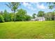 Spacious backyard, perfect for outdoor activities and enjoying the natural surroundings at 1621 California Rd, York, SC 29745