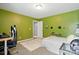 This green bedroom has a unique design with its desk, bed, and fun sporty decor at 1621 California Rd, York, SC 29745