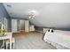 Spacious attic bedroom with ample lighting, neutral paint and carpet providing a cozy retreat at 1621 California Rd, York, SC 29745