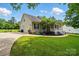 This home boasts an attached two-car garage, well-kept lawn, and inviting curb appeal at 1621 California Rd, York, SC 29745