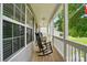 Relaxing front porch with rocking chairs, perfect for enjoying the outdoors at 1621 California Rd, York, SC 29745