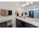Bright bathroom featuring a large vanity, a large mirror, and good lighting at 1770 Troon Dr, Salisbury, NC 28144
