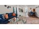 Stylish living room showcasing an open-concept design, seamlessly connecting to the kitchen and dining area at 1770 Troon Dr, Salisbury, NC 28144