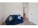 Comfortable living room with soft carpet, natural light, and a blue sofa at 1770 Troon Dr, Salisbury, NC 28144