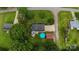 Aerial view of the property with pool, garage, deck, well-maintained lawns, and beautiful landscaping at 1867 Shannon Dr, Conover, NC 28613