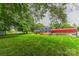Expansive backyard featuring green grass, a deck, and other outdoor amenities for leisure and entertainment at 1867 Shannon Dr, Conover, NC 28613