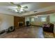 Spacious basement featuring a cozy brick fireplace and tile flooring, perfect for entertaining and relaxing at 1867 Shannon Dr, Conover, NC 28613