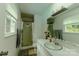 Clean bathroom featuring a shower, vanity, and ample lighting at 1867 Shannon Dr, Conover, NC 28613