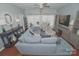 Cozy living room featuring a comfortable sectional sofa and access to an outdoor balcony, great for relaxing at 19182 Mallard Dr, Fort Mill, SC 29707
