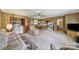 Living room with wood paneling and an eat-in kitchen at 2084 Old Evans Cir, Lancaster, SC 29720